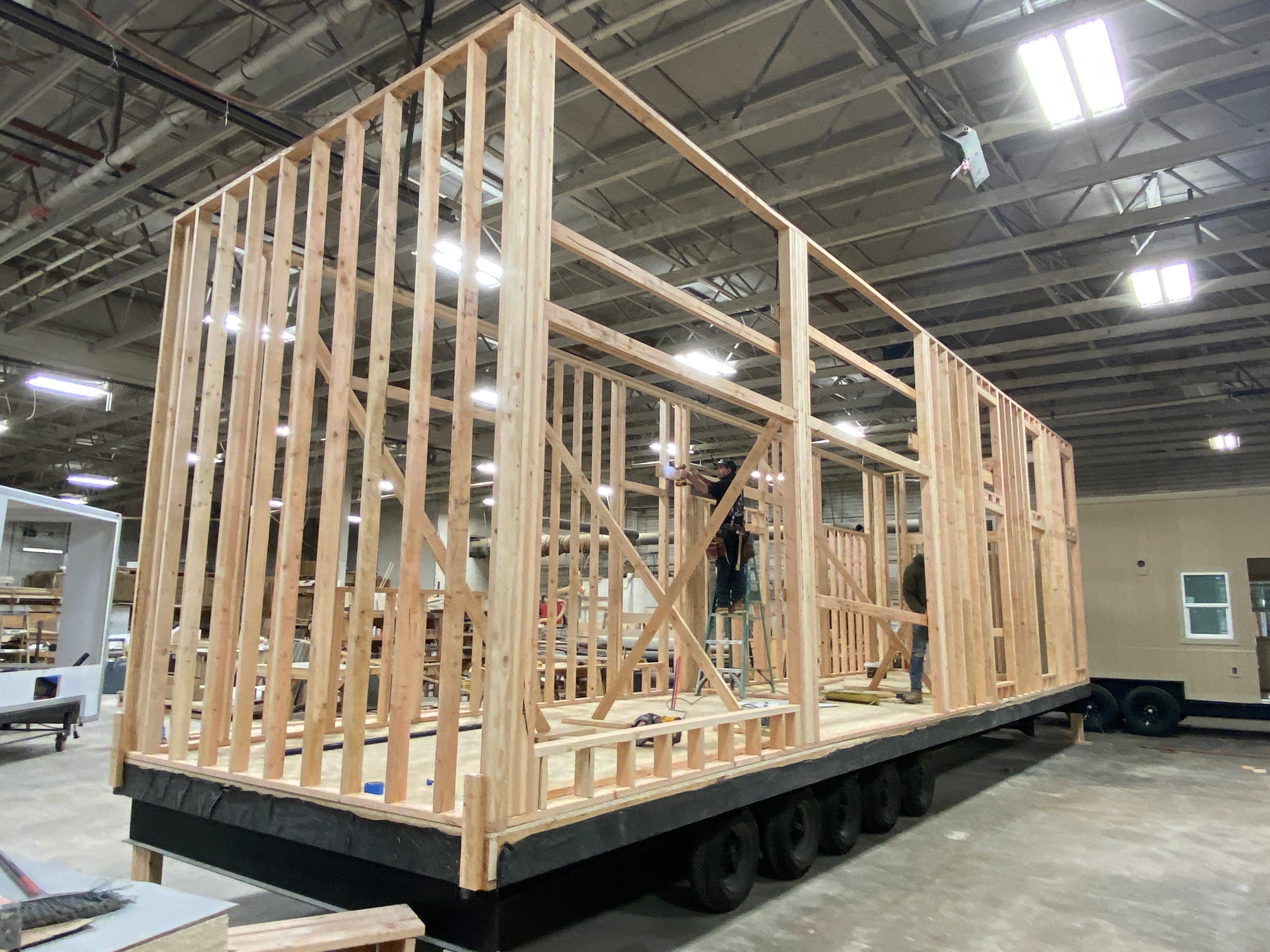 Montera Homes factory build — modular home wall framing under construction