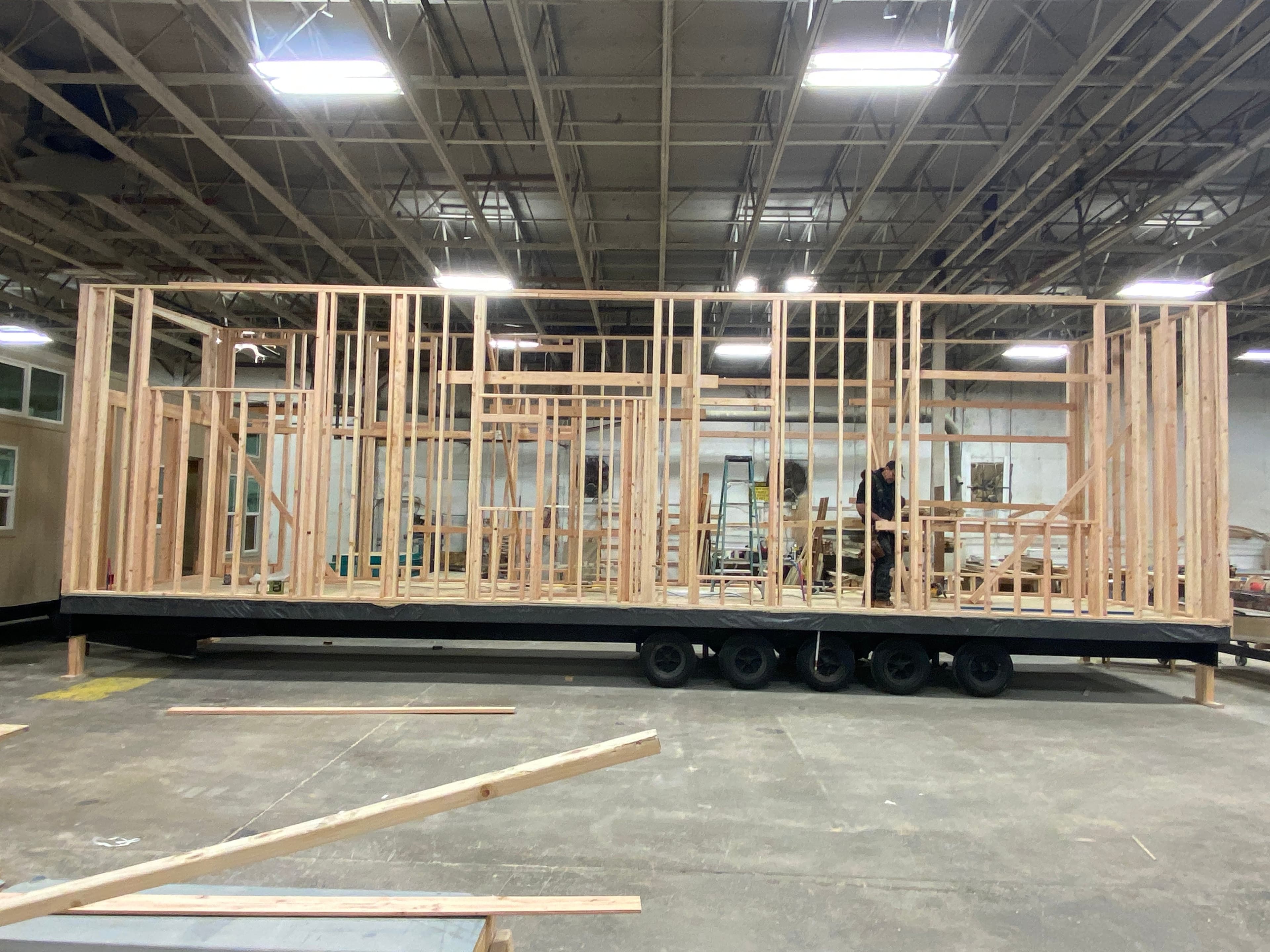 Montera Homes factory build — floor system assembly on production line
