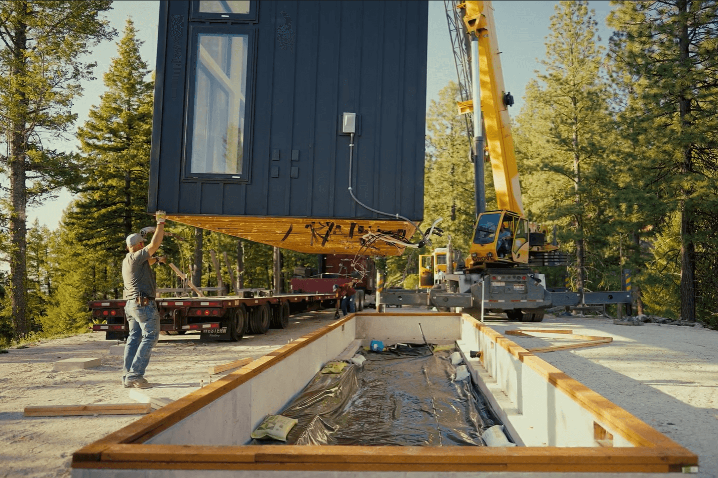 Montera Homes factory build — exterior siding and trim application