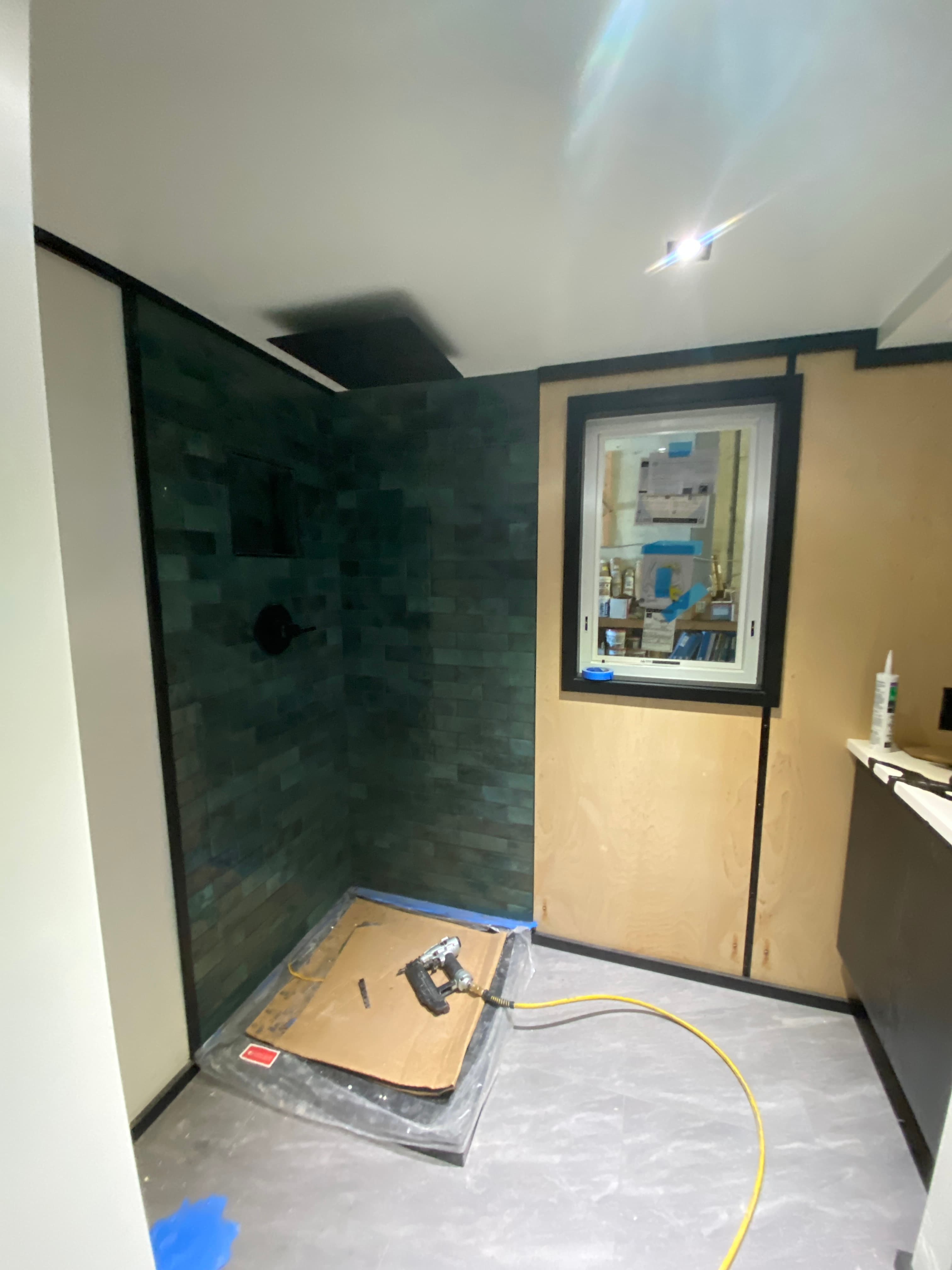 Montera Homes factory build — finished interior hallway with mountain view window